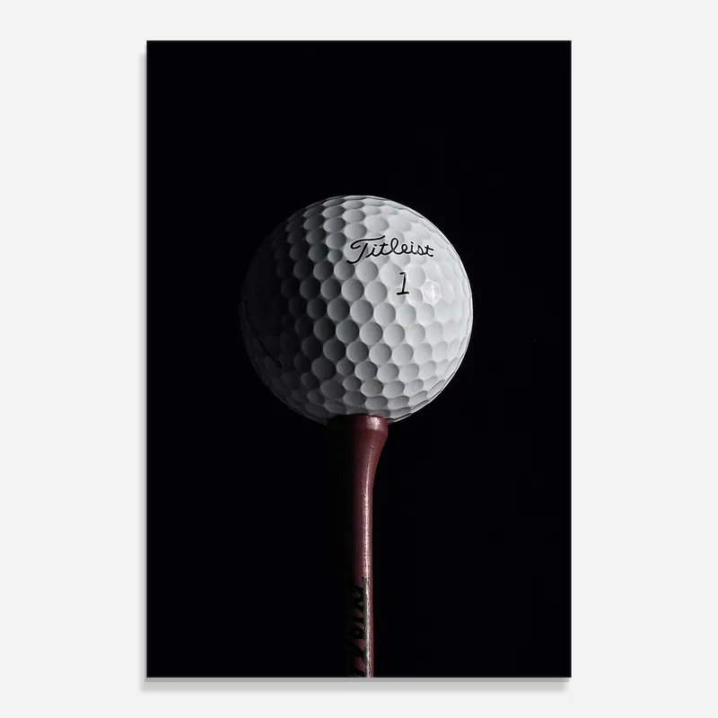 Glasbild White Golf Ball On Black Markenprodukt
