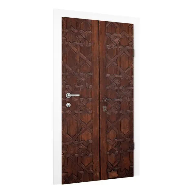 Altes verziertes Holztor im Alhambra Palast Türtapete Letzte Chance