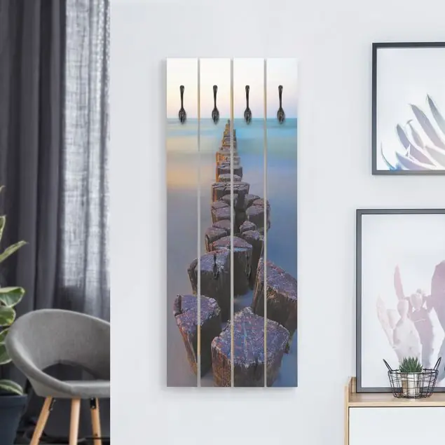 Sofort Bestellen Buhnen bei Sonnenuntergang am Meer Wandgarderobe