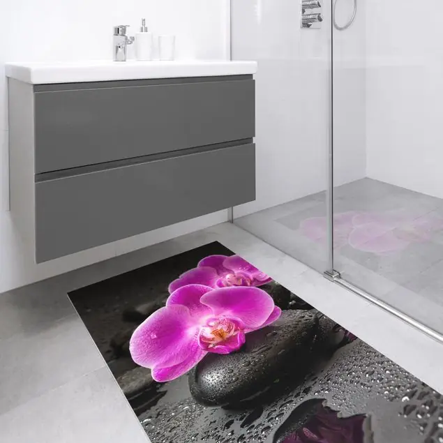 Pinke Orchideenblüten auf Steinen mit Tropfen Premium Vinylteppich 2,2 mm • hergestellt in Deutschland • glatt • abwaschbar • ideal für Haushalte mit Tieren Schnäppchen