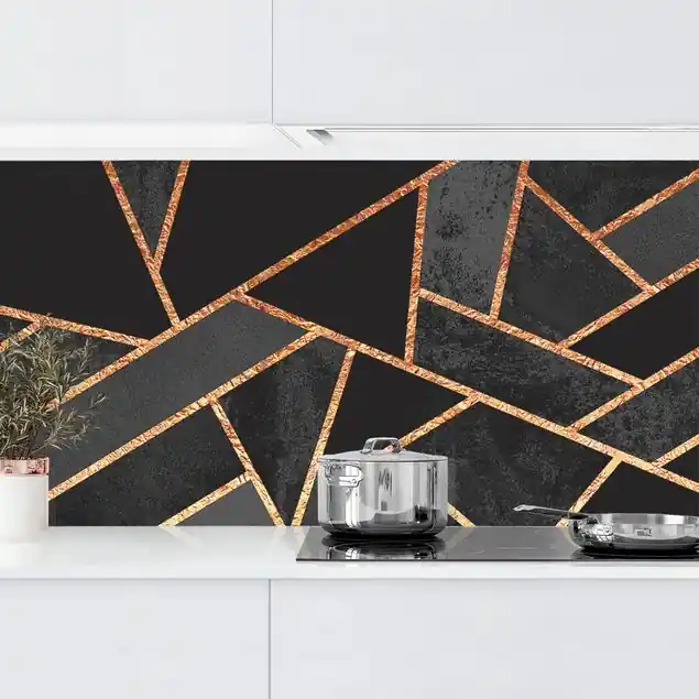 Schwarze Dreiecke Gold Küchenrückwand • selbstklebend • Spritzschutz • wasserfest • glänzend • 0,35 mm • hergestellt in Deutschland Ausverkauf